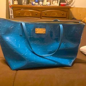 From a smoke free home, gently used Kate spade tote purse